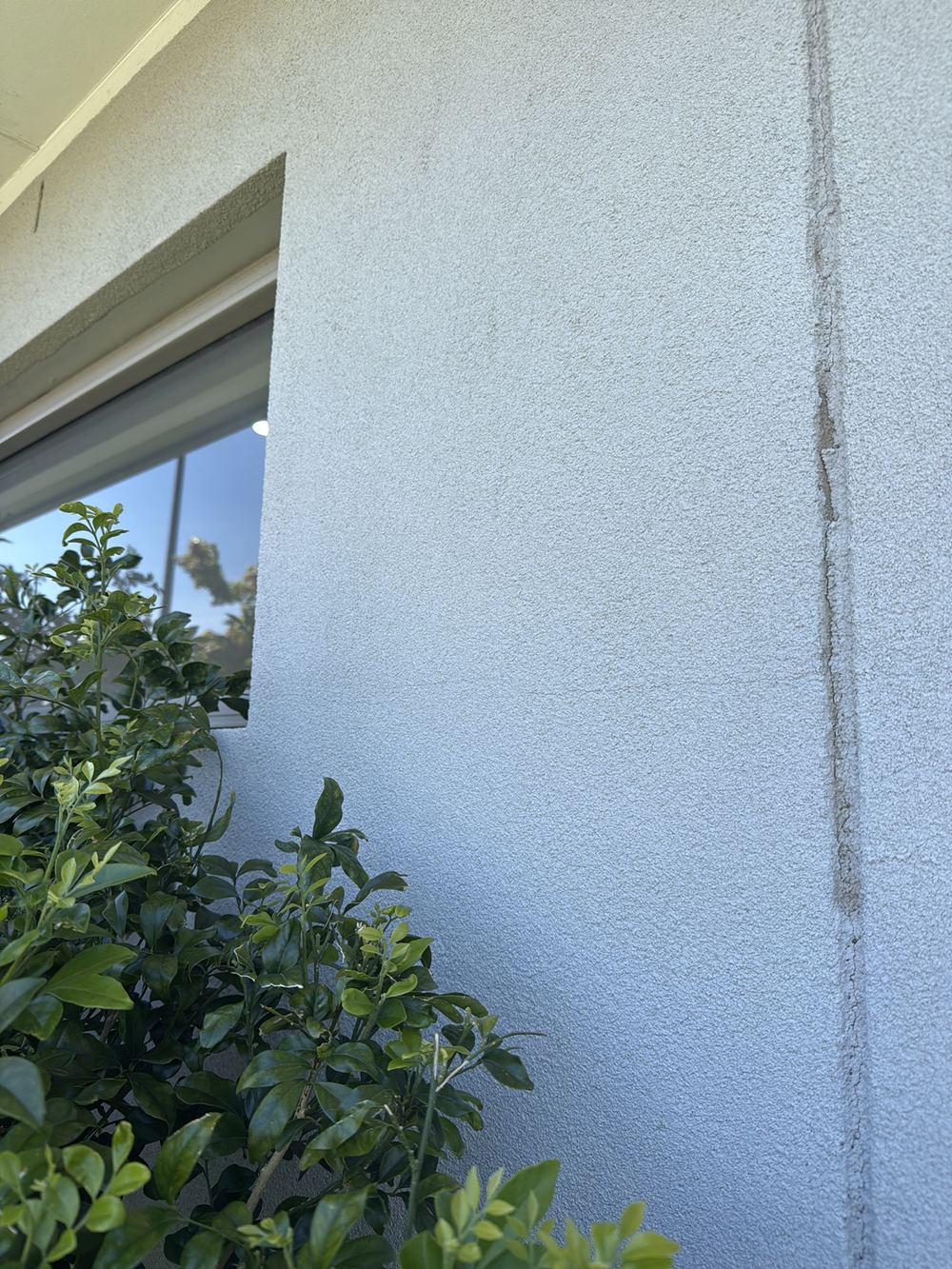 Fine cracking in the render and articulation joint, cosmetic but worth watching, found during a pre-purchase inspection in Officer